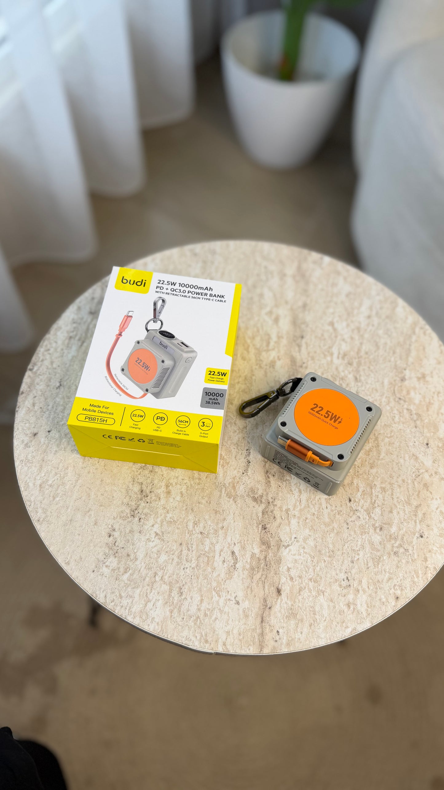 Budi 22.5W 1000 mAh PD + QC3.0 power bank with retractable 56 cm TYPE-C cable